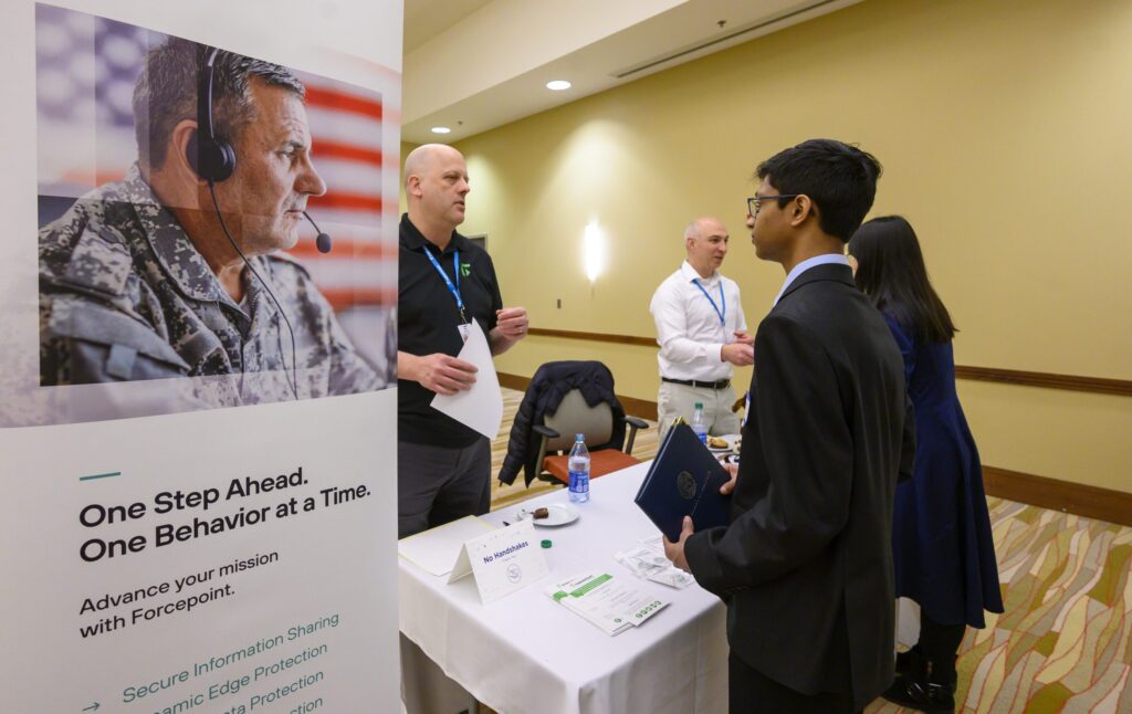 Students talk to Forcepoint recruiters