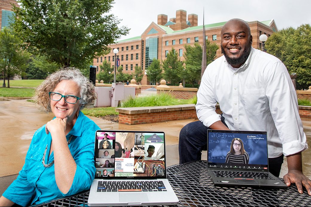 Gabriel Burks and Jennifer Amos Displaying their Virtual Biomechanics camp on laptops.