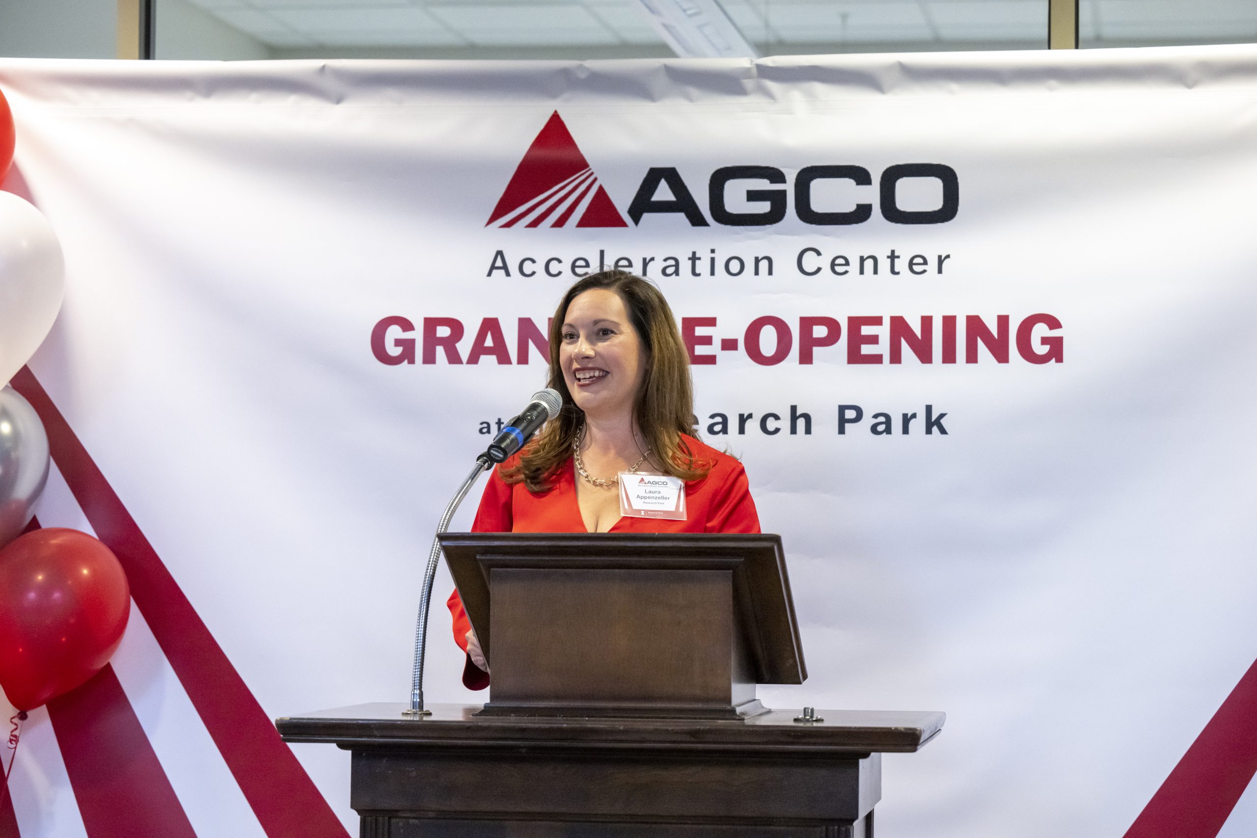 Laura Appenzeller speaking at Grand Re-Opening of AGCO.