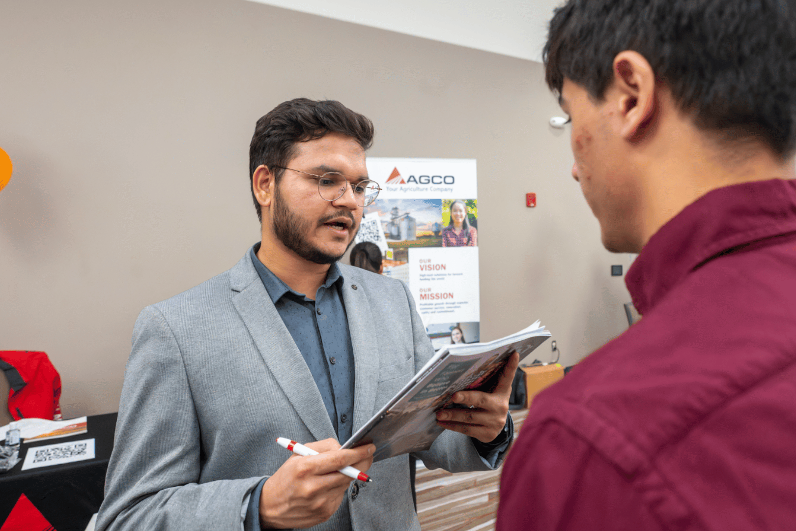AGCO recruiter reviewing student resume
