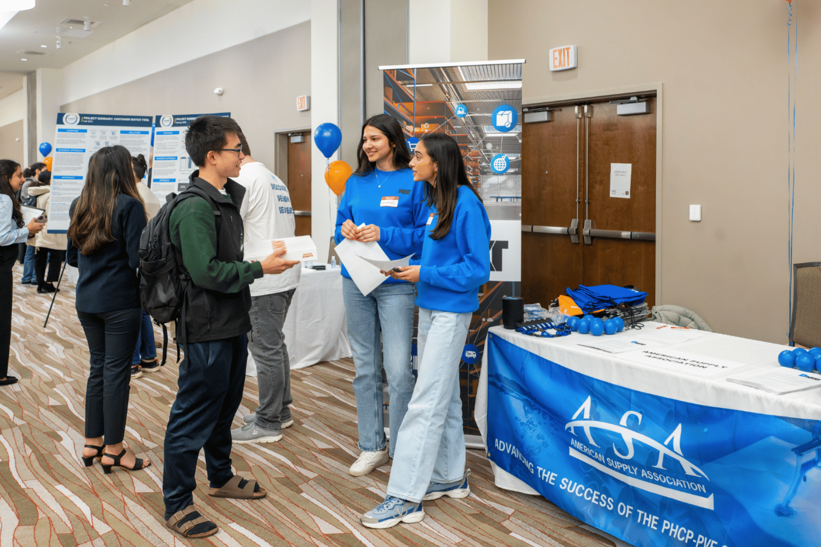 American Supply Association recruiters and student talking