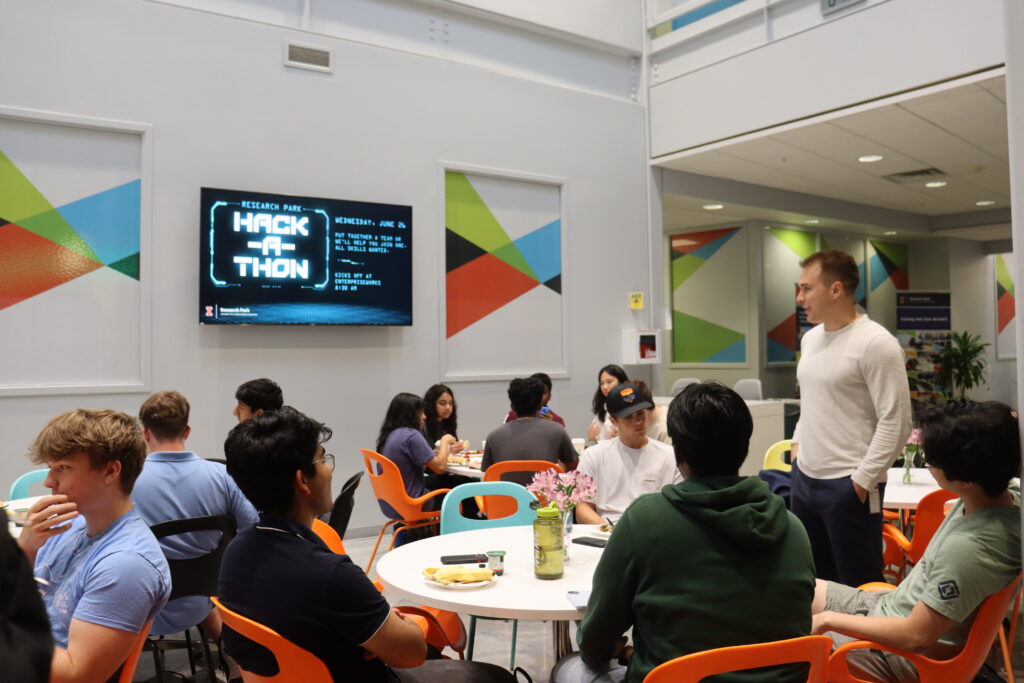 James Kabbes speaks to Hackathon participants at kickoff breakfast