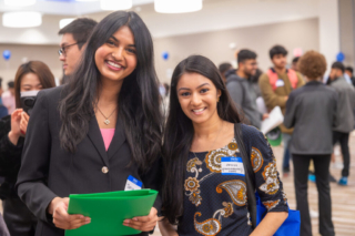 Students smiling at Career Fair